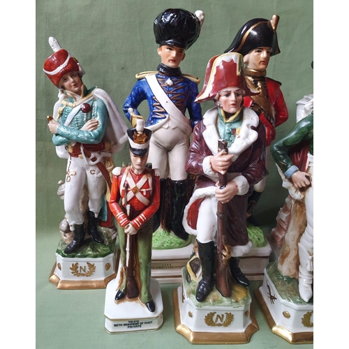 47 - A collection of military porcelain figures - some a/f.