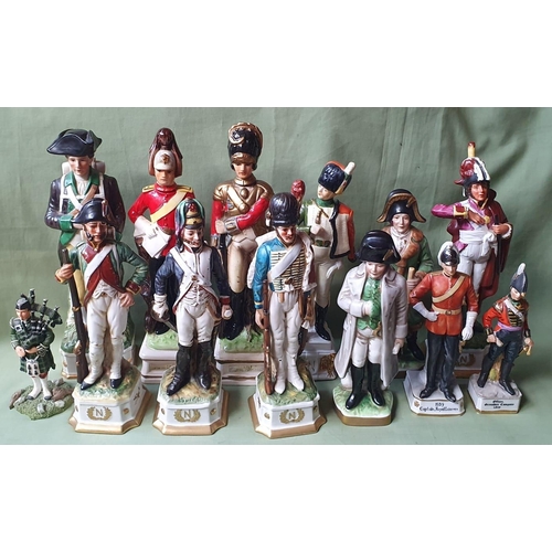 47a - A collection of military porcelain figures - some a/f.