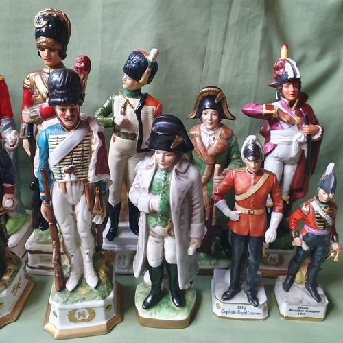 47a - A collection of military porcelain figures - some a/f.