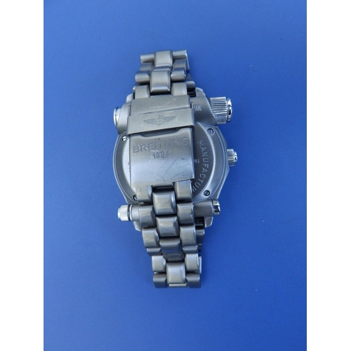 203 - A gent's titanium Breitling Emergency quartz bracelet wrist watch E56121.1, in fitted plastic carry ... 