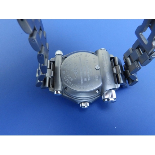 203 - A gent's titanium Breitling Emergency quartz bracelet wrist watch E56121.1, in fitted plastic carry ... 