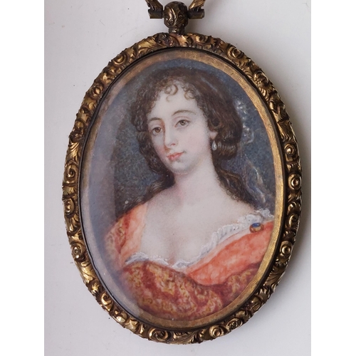 6 - An oval watercolour head & shoulders portrait miniature on ivory, depicting a 17thC lady in orange-t... 