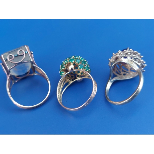 229 - Three gem set 9ct dress rings.