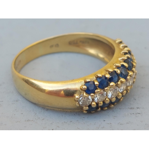 237 - A sapphire & diamond triple row 18ct gold band ring.  Finger size P.