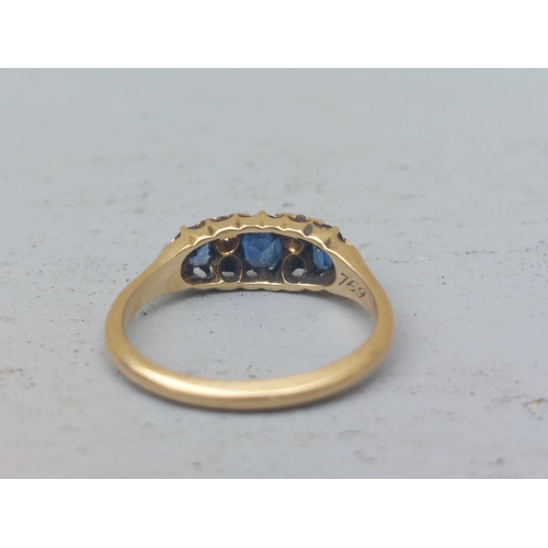 241 - A small sapphire & rose cut diamond ring.  Finger size L.