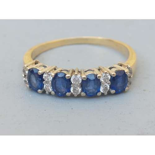 242 - A sapphire & diamond set half-eternity style ring on 18ct shank.  Finger size S.