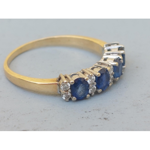 242 - A sapphire & diamond set half-eternity style ring on 18ct shank.  Finger size S.