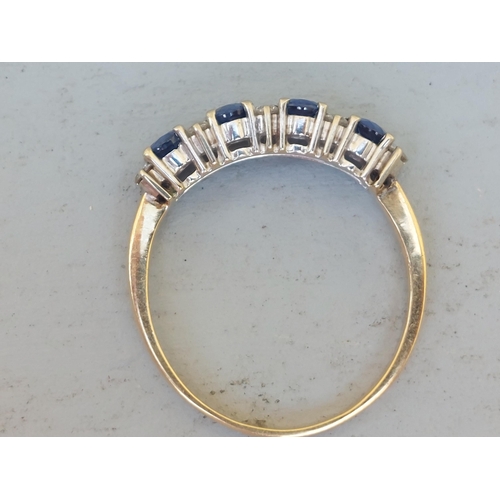 242 - A sapphire & diamond set half-eternity style ring on 18ct shank.  Finger size S.