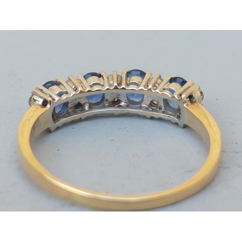 242 - A sapphire & diamond set half-eternity style ring on 18ct shank.  Finger size S.