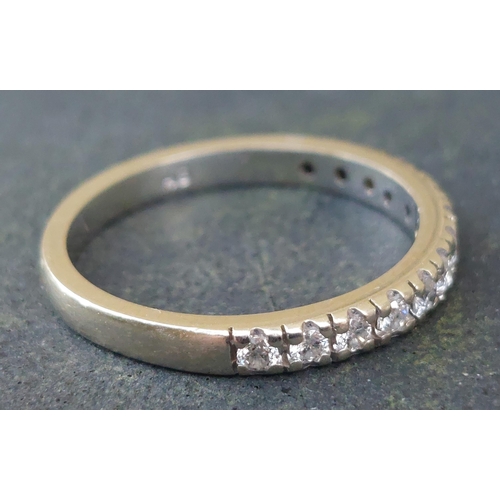 251 - A diamond half eternity ring set with 12 stones in white 14k.  Finger size N/O.