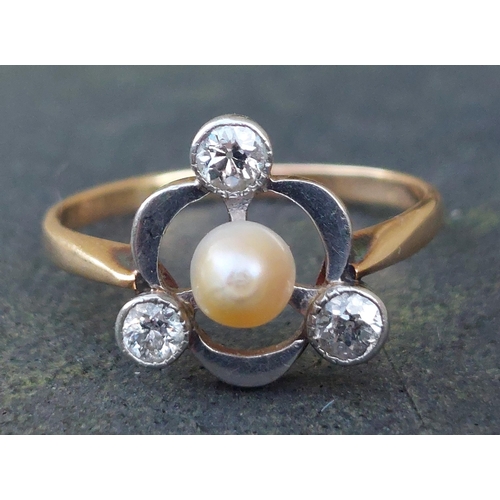 256 - A pearl & diamond openwork dress ring of triform plan - 585.  Finger size L/M.