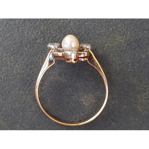 256 - A pearl & diamond openwork dress ring of triform plan - 585.  Finger size L/M.