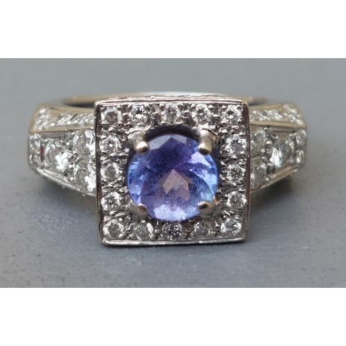 310 - A tanzanite & pave set diamond square cluster style ring, pave set diamonds extending onto the shoul... 