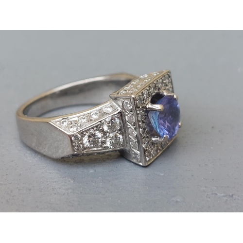 310 - A tanzanite & pave set diamond square cluster style ring, pave set diamonds extending onto the shoul... 