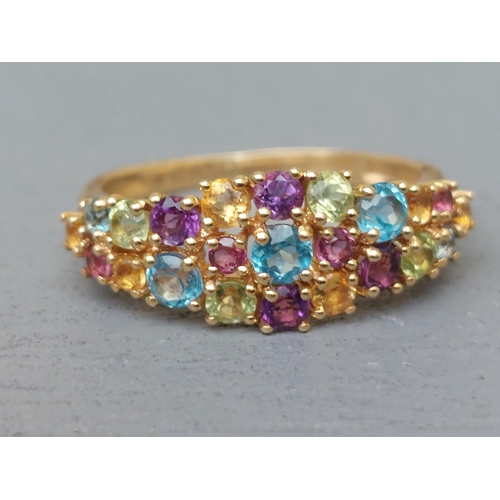 261 - A multi-stone tutti frutti 18ct gold ring - Sheffield marks.  Finger size P.