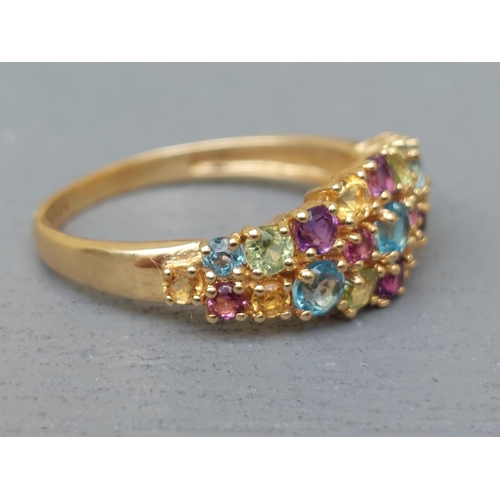 261 - A multi-stone tutti frutti 18ct gold ring - Sheffield marks.  Finger size P.