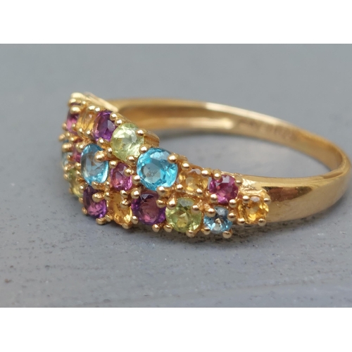 261 - A multi-stone tutti frutti 18ct gold ring - Sheffield marks.  Finger size P.