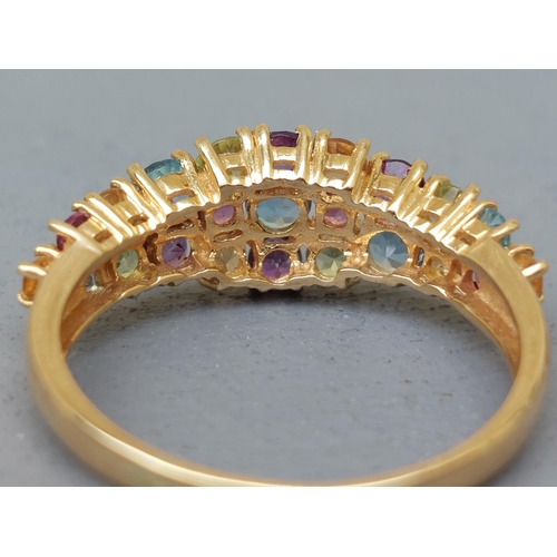 261 - A multi-stone tutti frutti 18ct gold ring - Sheffield marks.  Finger size P.