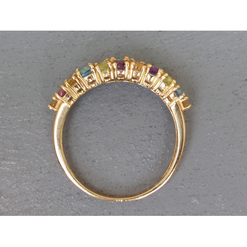 261 - A multi-stone tutti frutti 18ct gold ring - Sheffield marks.  Finger size P.