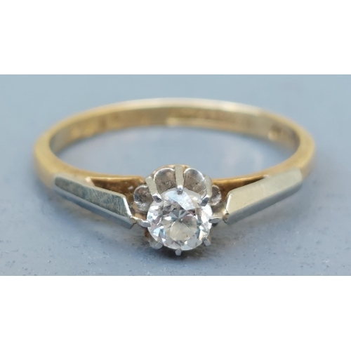 270 - A small solitaire diamond ring in 18ct & PLAT.  Finger size N/O.