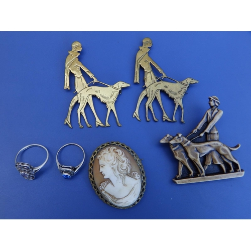 283 - A Bernard Ingstone silver ring, two cut brass Vogue Magazine art deco figural brooches and three oth... 