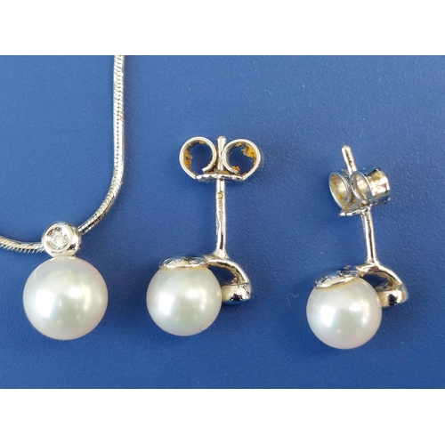 317 - A boxed pair of pearl & diamond set 18ct white gold earrings by Pascal at Selfridges, together with ... 