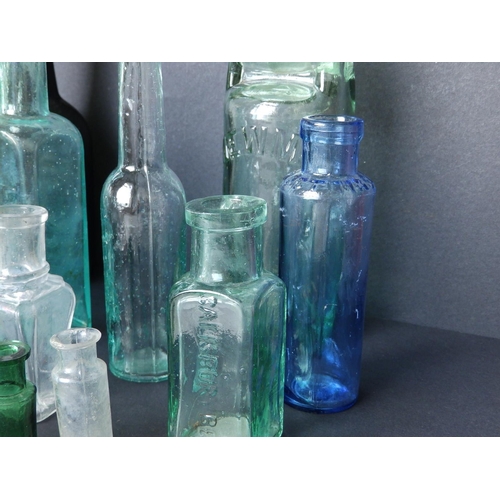 26 - A collection of 15 small glass bottles, including beer bottles and others, two from Hancock of Wivel... 