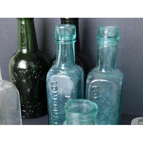 26 - A collection of 15 small glass bottles, including beer bottles and others, two from Hancock of Wivel... 