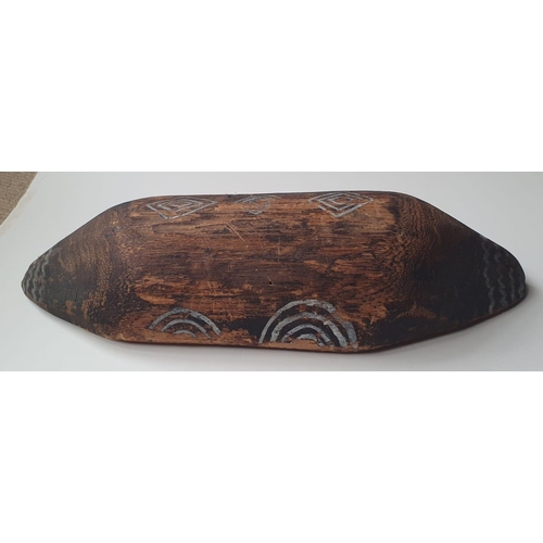 70 - A carved wood Aboriginal shield with painted decoration, 18.5