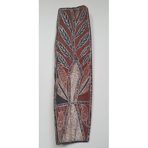 72 - An Aboriginal painted wood panel, 20