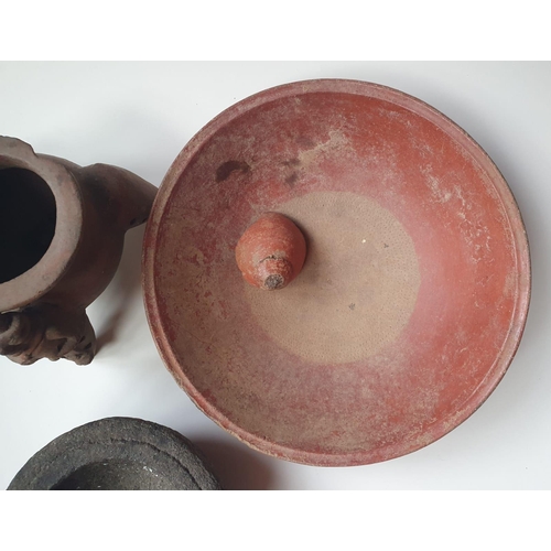 74 - Three South American artefacts, comprising two pottery vessels, the larger 10