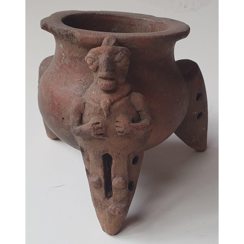 74 - Three South American artefacts, comprising two pottery vessels, the larger 10