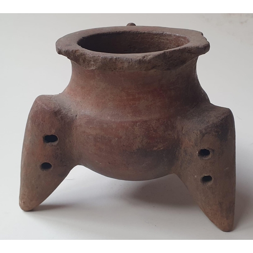 74 - Three South American artefacts, comprising two pottery vessels, the larger 10