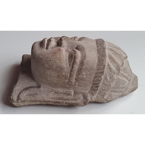 75 - An Indian carved stone bust, 5.25