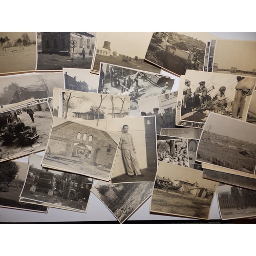 14 - A collection  of 75 German WWII small format black & white photographs depicting life for soldiers a... 