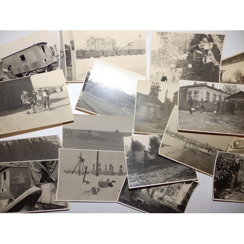 14 - A collection  of 75 German WWII small format black & white photographs depicting life for soldiers a... 