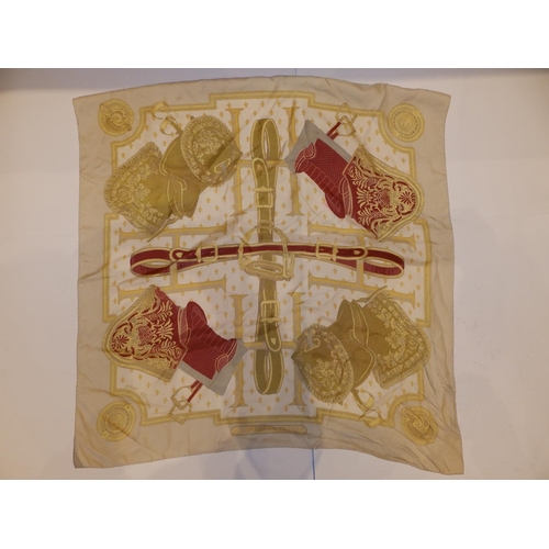 43 - A silk Hermes headscarf - 'Selles a Housse', 34.5