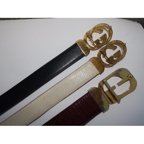 51 - Three Gucci leather belts - the longest 35