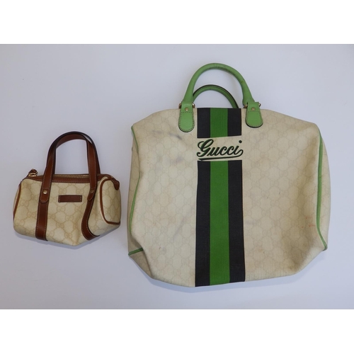 53 - A Gucci green-striped cream canvas bag with green leather handles,  12