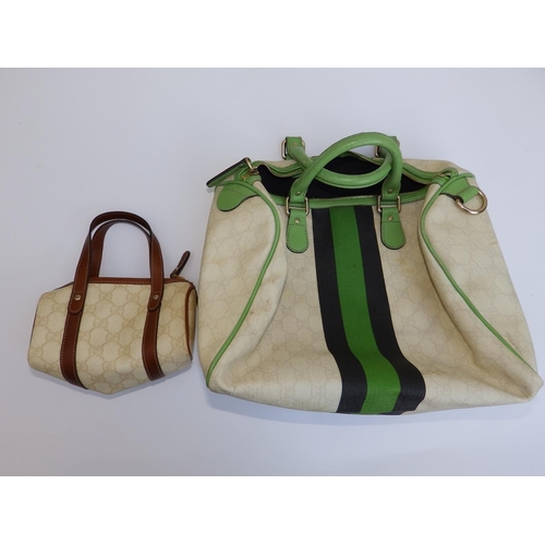 53 - A Gucci green-striped cream canvas bag with green leather handles,  12