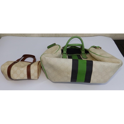 53 - A Gucci green-striped cream canvas bag with green leather handles,  12