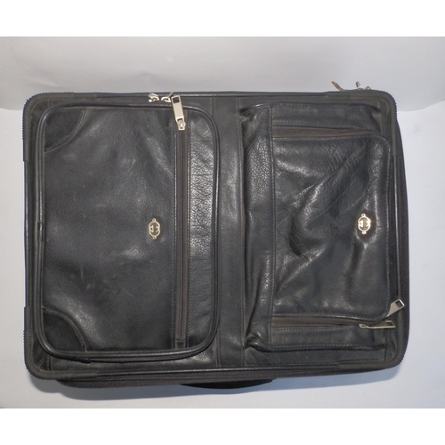 55 - A Gucci black leather travel case on wheels, 20