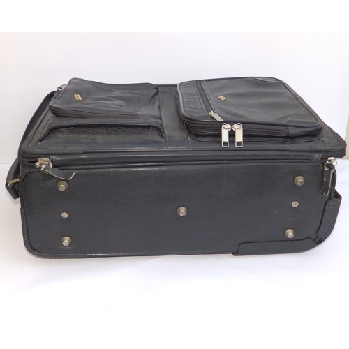 55 - A Gucci black leather travel case on wheels, 20