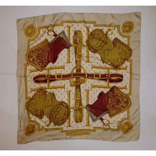 43 - A silk Hermes headscarf - 'Selles a Housse', 34.5