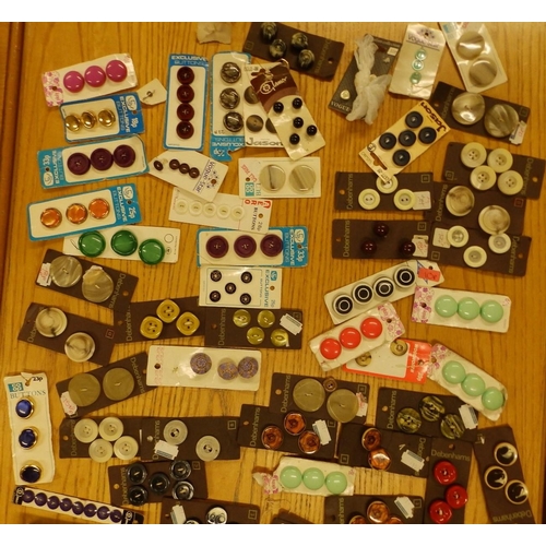 84 - A collection of late 20thC buttons.