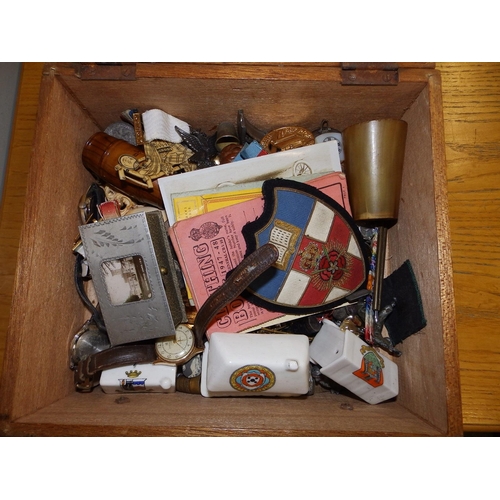 90 - A box containing military and other small collectable items.