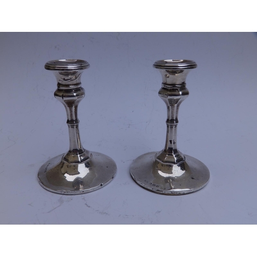 95 - A small pair of  silver tapersticks - Birmingham 1910/11,  4.25