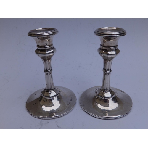 95 - A small pair of  silver tapersticks - Birmingham 1910/11,  4.25