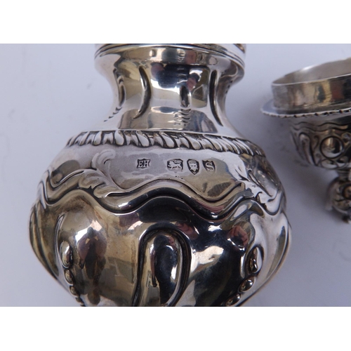 102 - A late Victorian rococo revival style silver sugar caster - EH, London  1893,  8