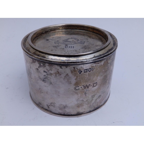 105 - An Edwardian silver presentation tin , the lid engraved with the crest of the Rawlins family - 'Nec ... 